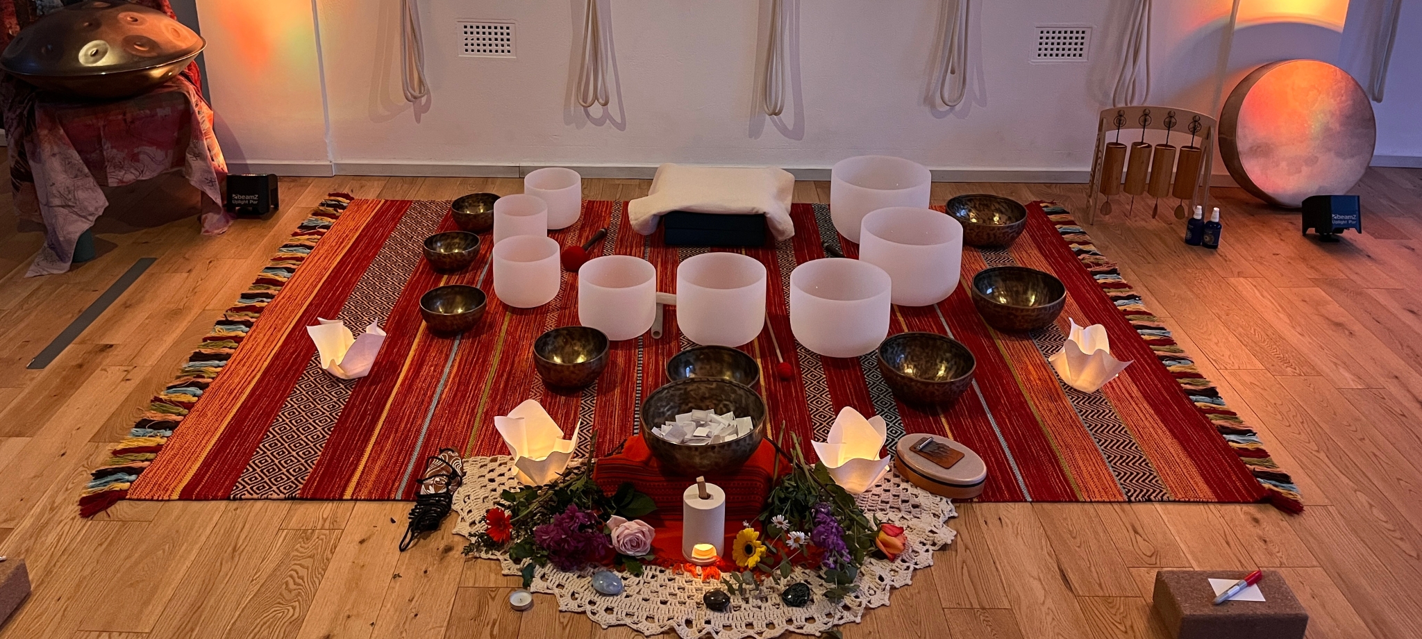 an image of a sound bath set up at yogarise yoga studio of queens park in london held by craig rogerson on a sunday